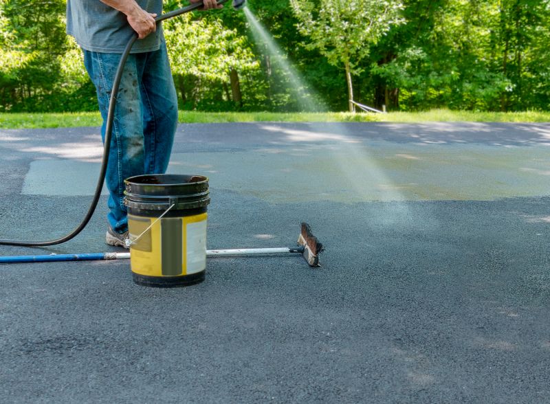 Local Driveway Asphalt Sealing pros at work
